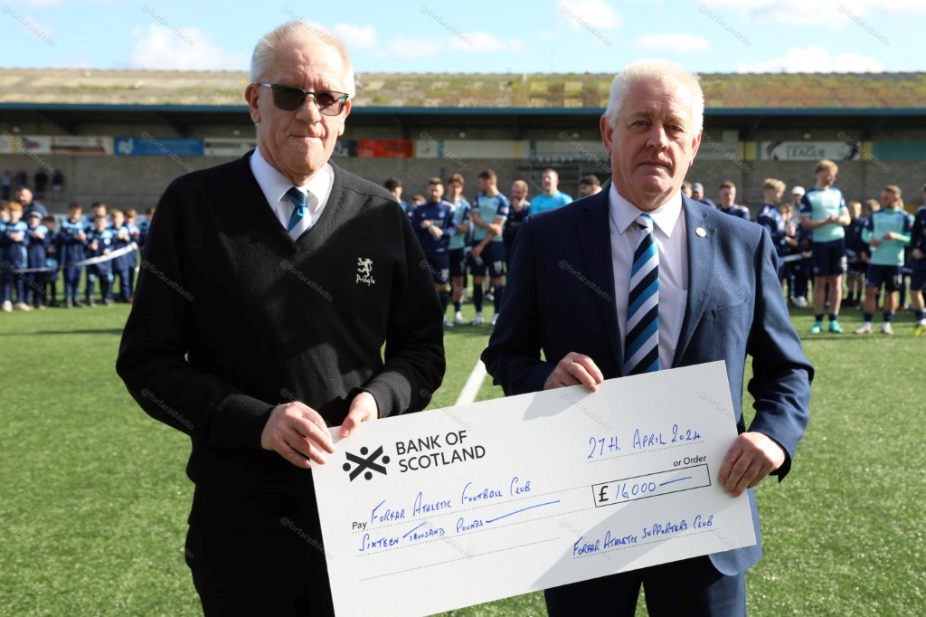 David Strachan of the Supporters' Club presents the Forfar Athletic Chairman, Scott Murdie, with a cheque for £9,000 IMG 9563